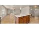 Open kitchen island with tile floors and view into the living space at 2725 W Silver Creek Ln, San Tan Valley, AZ 85144