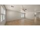 Bright living room with ceiling fan and tile floors at 2725 W Silver Creek Ln, San Tan Valley, AZ 85144