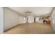 Open concept living space featuring tile flooring that flows into the kitchen at 2725 W Silver Creek Ln, San Tan Valley, AZ 85144