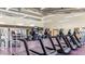 Bright gym featuring rows of treadmills and workout machines at 28200 N Nealite Dr, San Tan Valley, AZ 85143