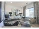 Bright home office with large windows and multiple workspaces, perfect for productivity at 28282 N 158Th St, Scottsdale, AZ 85262