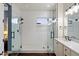 Stylish bathroom with frameless glass shower, modern fixtures, and sleek vanity at 4088 E Comstock Dr, Gilbert, AZ 85296