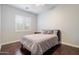 Serene bedroom featuring a comfortable bed and neutral decor, creating a relaxing atmosphere at 4088 E Comstock Dr, Gilbert, AZ 85296