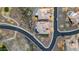 Aerial view of luxury homes with private pools and solar panels in a desert community at 41711 N Pinion Hills Ct, Anthem, AZ 85086