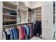 Spacious closet with custom organizers, shelving, and hanging space for clothes and shoes at 41711 N Pinion Hills Ct, Anthem, AZ 85086