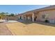 Spacious backyard featuring covered patio and well-maintained desert landscaping at 4936 E Villa Rita Dr, Scottsdale, AZ 85254
