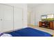 Relaxing bedroom featuring a TV, closet, and a window to let the sun in at 4936 E Villa Rita Dr, Scottsdale, AZ 85254