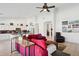 Bright living room with a comfortable sofa, kitchen and tile flooring at 4936 E Villa Rita Dr, Scottsdale, AZ 85254