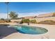 Sparkling swimming pool with lounge chairs and desert landscaping at 4936 E Villa Rita Dr, Scottsdale, AZ 85254