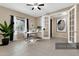 Bright home office with large windows, modern desk, stylish decor, and neutral wall paint at 5265 S Dante --, Mesa, AZ 85212