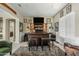 Entertainer's bar area with custom cabinetry, ample storage, seating, and stylish decor at 5334 S Parkwood --, Mesa, AZ 85212