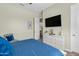 A well lit bedroom with carpet, ceiling fan, and light colored walls at 5334 S Parkwood --, Mesa, AZ 85212