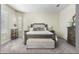 Spacious main bedroom features a large window, bench seating, and a ceiling fan at 5334 S Parkwood --, Mesa, AZ 85212