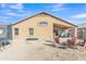 View of the expansive backyard with covered patio, and room for outdoor activities at 5653 E Athena Rd, Florence, AZ 85132