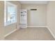 The bonus room features tile flooring and a bright window for natural light at 5653 E Athena Rd, Florence, AZ 85132