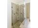 Glass-enclosed shower with custom tile work and built-in niche at 6791 W Megan St, Chandler, AZ 85226