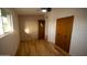 Bedroom with hardwood flooring, closet, window and neutral colors at 7420 W Cinnabar Ave, Peoria, AZ 85345