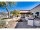 Exterior shot of a brick walkway and garden at the Carriage Manor Resort at 7750 E Broadway Rd # 756, Mesa, AZ 85208