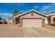 Charming single-story home with a two-car garage and low-maintenance desert landscaping at 7808 W Palo Verde Dr, Glendale, AZ 85303