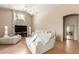 Bright living area with wood flooring, large windows and a ceiling fan at 7808 W Palo Verde Dr, Glendale, AZ 85303