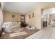 Cozy living room with neutral decor, carpeted floors and archway access to other rooms at 7808 W Palo Verde Dr, Glendale, AZ 85303