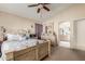 Spacious main bedroom with an en-suite bathroom entrance at 7808 W Palo Verde Dr, Glendale, AZ 85303