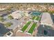 Aerial view of community bocce ball courts, pool and pickleball courts at 8118 E Medina Ave, Mesa, AZ 85209
