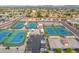 Aerial view of well-maintained tennis courts and bocce ball in a meticulously maintained community at 8118 E Medina Ave, Mesa, AZ 85209