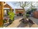 Spacious backyard with desert landscaping, built-in outdoor kitchen, and dining pergola perfect for entertaining at 8720 E Via De Dorado --, Scottsdale, AZ 85258