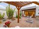 Enjoy outdoor living with a fire pit, cacti, and comfortable seating in this tranquil yard at 8720 E Via De Dorado --, Scottsdale, AZ 85258