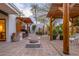Entertain in style with a backyard featuring an outdoor kitchen, fire pit, and spacious tiled patio at 8720 E Via De Dorado --, Scottsdale, AZ 85258