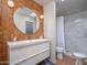 Stylish bathroom with modern vanity, terracotta tile accents, and a walk-in shower for a luxurious feel at 8720 E Via De Dorado --, Scottsdale, AZ 85258