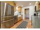 Cozy kitchen with stainless steel appliances, wood cabinetry, and ample counter space at 8720 E Via De Dorado --, Scottsdale, AZ 85258
