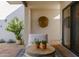 Charming outdoor patio with comfortable seating, terracotta flooring, and decorative wall accents at 8720 E Via De Dorado --, Scottsdale, AZ 85258