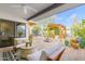 Inviting patio showcases comfortable seating, pergola, and beautiful desert landscaping at 8720 E Via De Dorado --, Scottsdale, AZ 85258