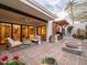 Inviting patio with cozy seating and a built-in BBQ area for outdoor entertaining at 8720 E Via De Dorado --, Scottsdale, AZ 85258