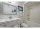 Modern bathroom with a stylish vanity and a shower/tub combination at 9441 W Long Hills Dr, Sun City, AZ 85351