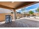 Outdoor kitchen and landscaping makes this backyard perfect for gathering and entertaining at 9952 W Jessie Ln, Peoria, AZ 85383