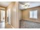 Bedroom featuring neutral walls, carpet flooring, and a bright window at 9952 W Jessie Ln, Peoria, AZ 85383