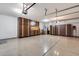 Spacious garage equipped with custom cabinets and ample storage space at 9952 W Jessie Ln, Peoria, AZ 85383