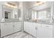 Bathroom featuring dual sinks, granite countertops, and ample storage space at 10054 E Bell Rd, Scottsdale, AZ 85260