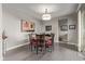 Cozy dining room features a round table, decorative lighting, and stylish wall art at 10054 E Bell Rd, Scottsdale, AZ 85260