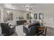 Comfortable living room features modern furnishings, lots of windows, and neutral décor at 10054 E Bell Rd, Scottsdale, AZ 85260