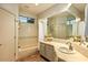 Bathroom with vanity, bathtub, and large mirror at 10767 E Santa Fe Trl, Scottsdale, AZ 85262