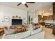 Open-concept living room seamlessly connects to the kitchen and dining area, perfect for entertaining at 10767 E Santa Fe Trl, Scottsdale, AZ 85262