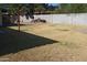 Large backyard with plenty of space, including a woodpile ready for the fireplace at 11406 W Montana Ave, Youngtown, AZ 85363