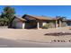 Beautiful single-story home with an attached garage and desert landscaping at 11406 W Montana Ave, Youngtown, AZ 85363