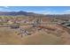 Community recreation area with covered seating, pickleball and bocce ball courts, set against a backdrop of mountain views at 12686 E Pivot Peak --, Gold Canyon, AZ 85118