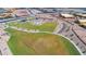 Aerial view of a neighborhood park featuring a volleyball court, and playground at 12686 E Pivot Peak --, Gold Canyon, AZ 85118