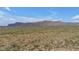 Vast desert landscape featuring native vegetation and mountain views in the distance at 12686 E Pivot Peak --, Gold Canyon, AZ 85118